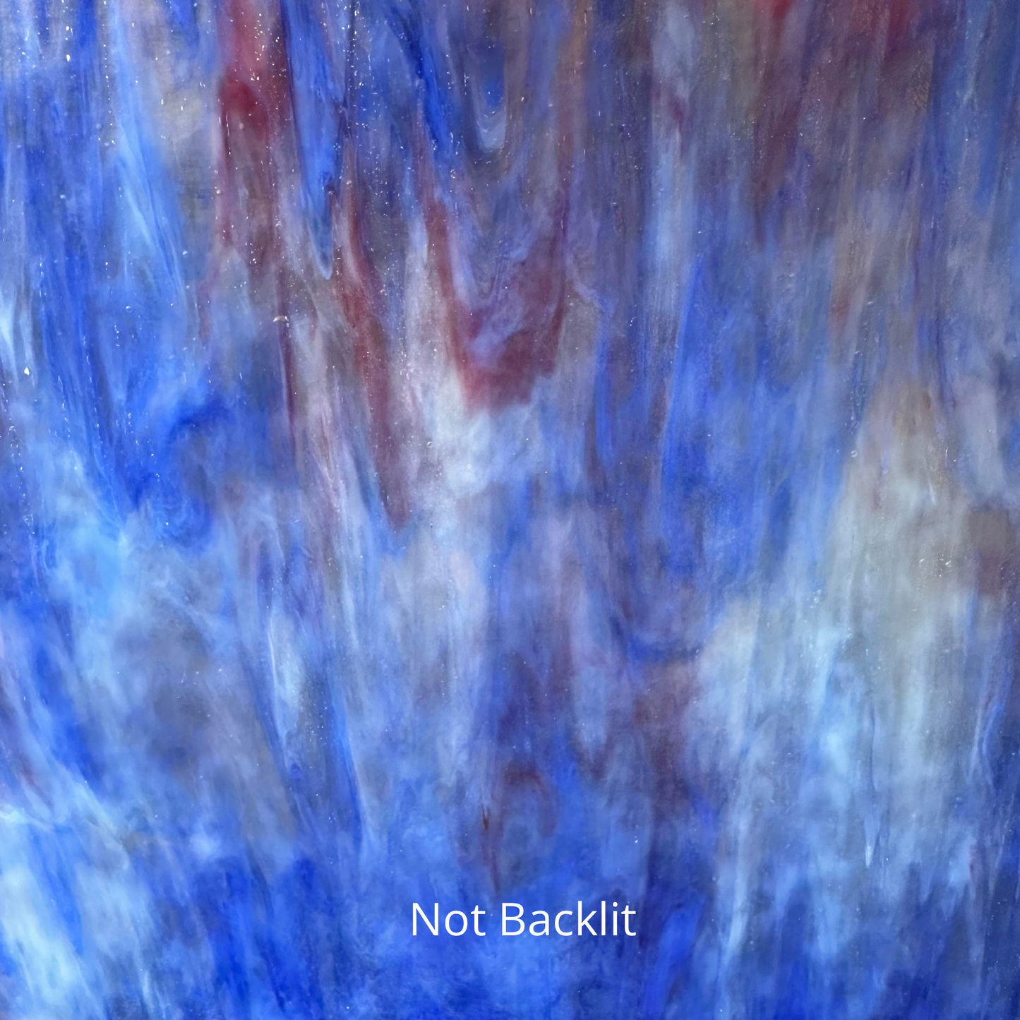 A blue white and pink piece of sheet glass.