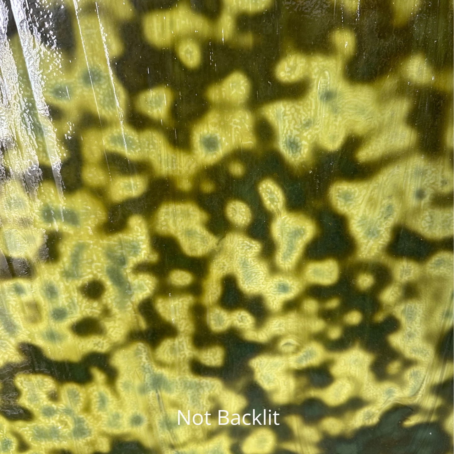 Green mottled art glass.