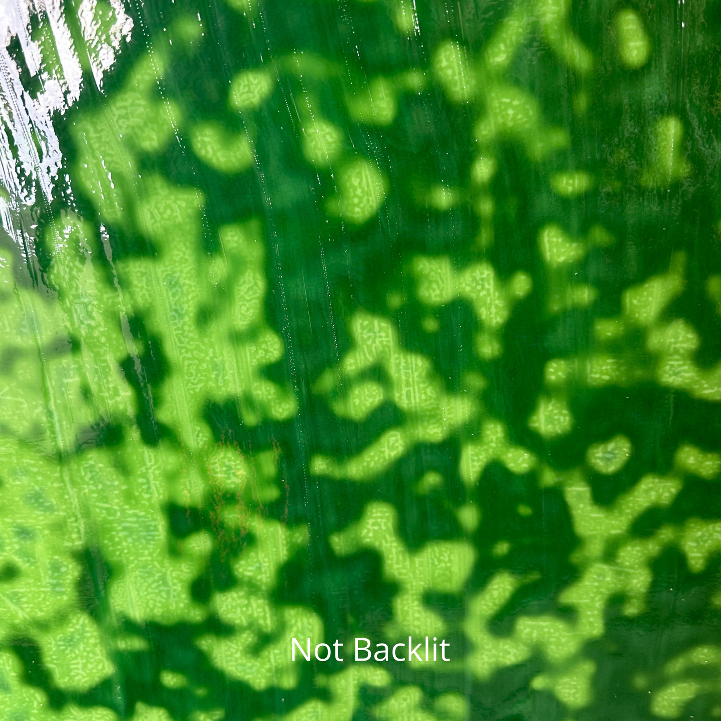 Green mottled art glass.
