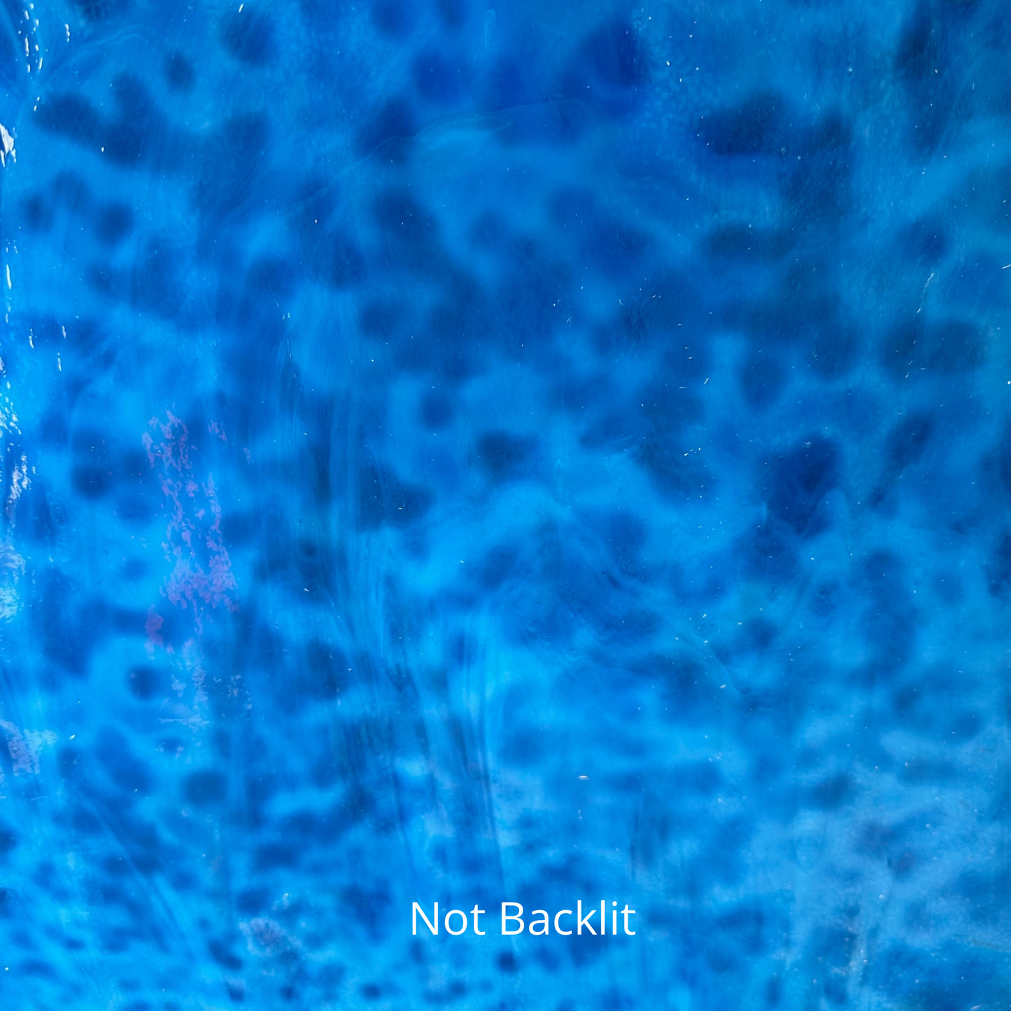 Mottled blue art glass.