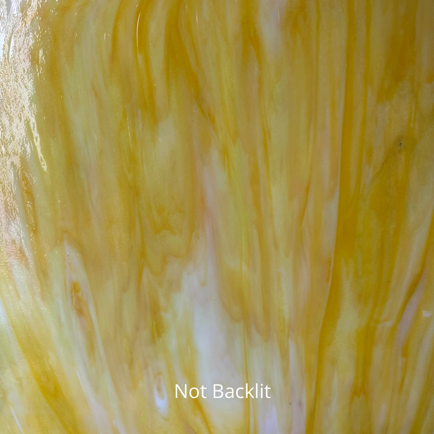Yellow and white art glass.