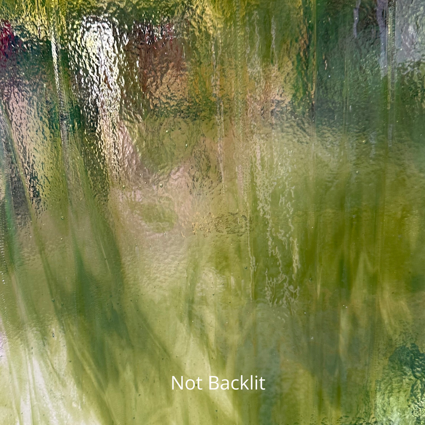 Clear and fern green art glass.