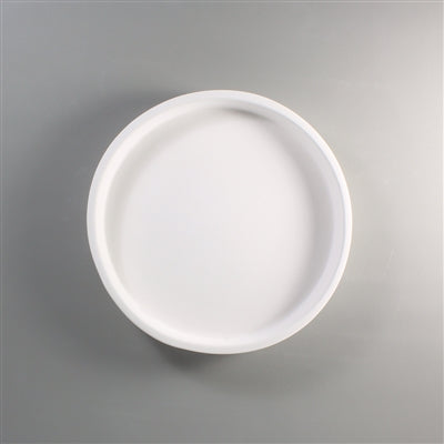 A medium round dam mold for glass fusing.