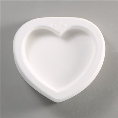 Heart fritter mold for glass fusing.