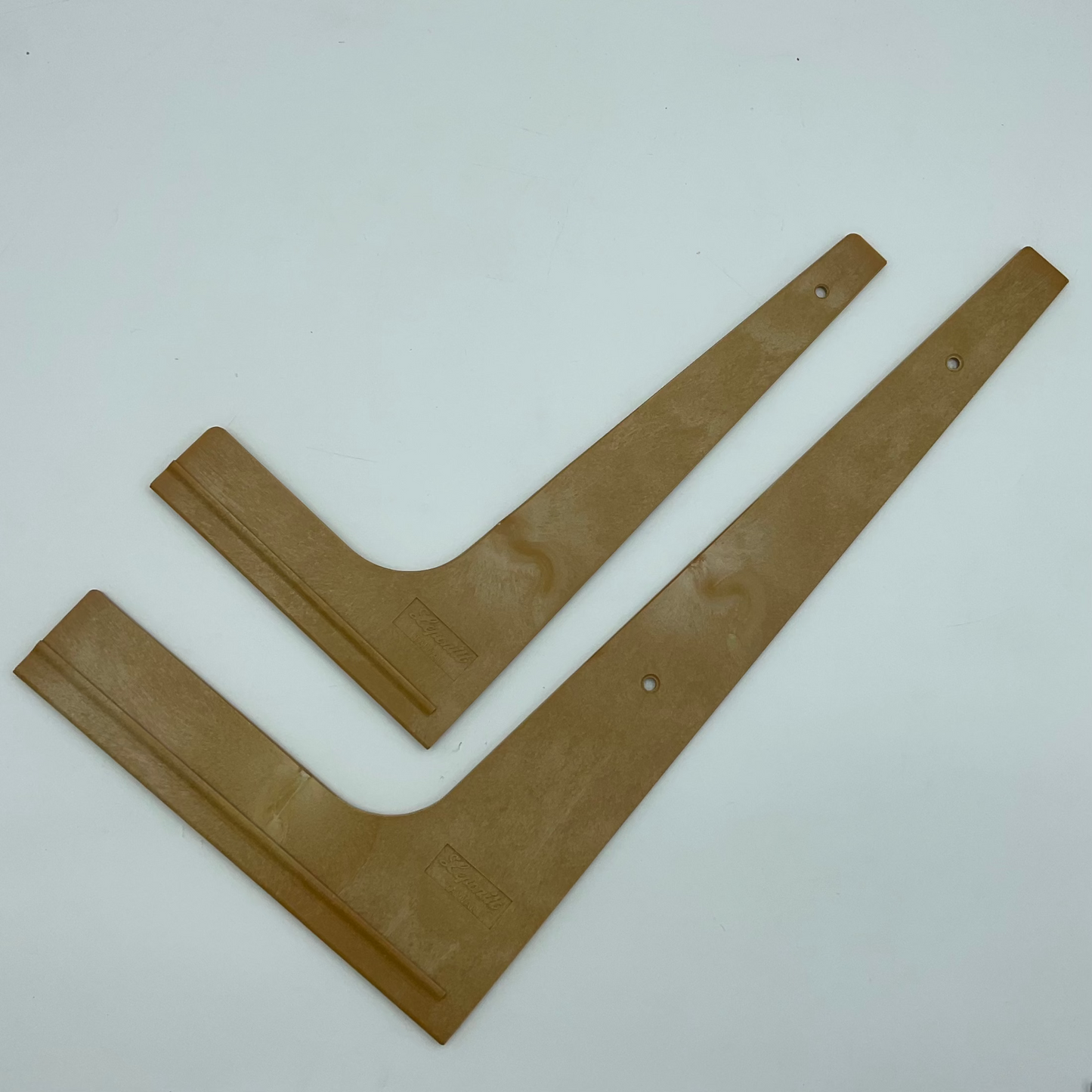 Two Leponnitt glass cutting squares.