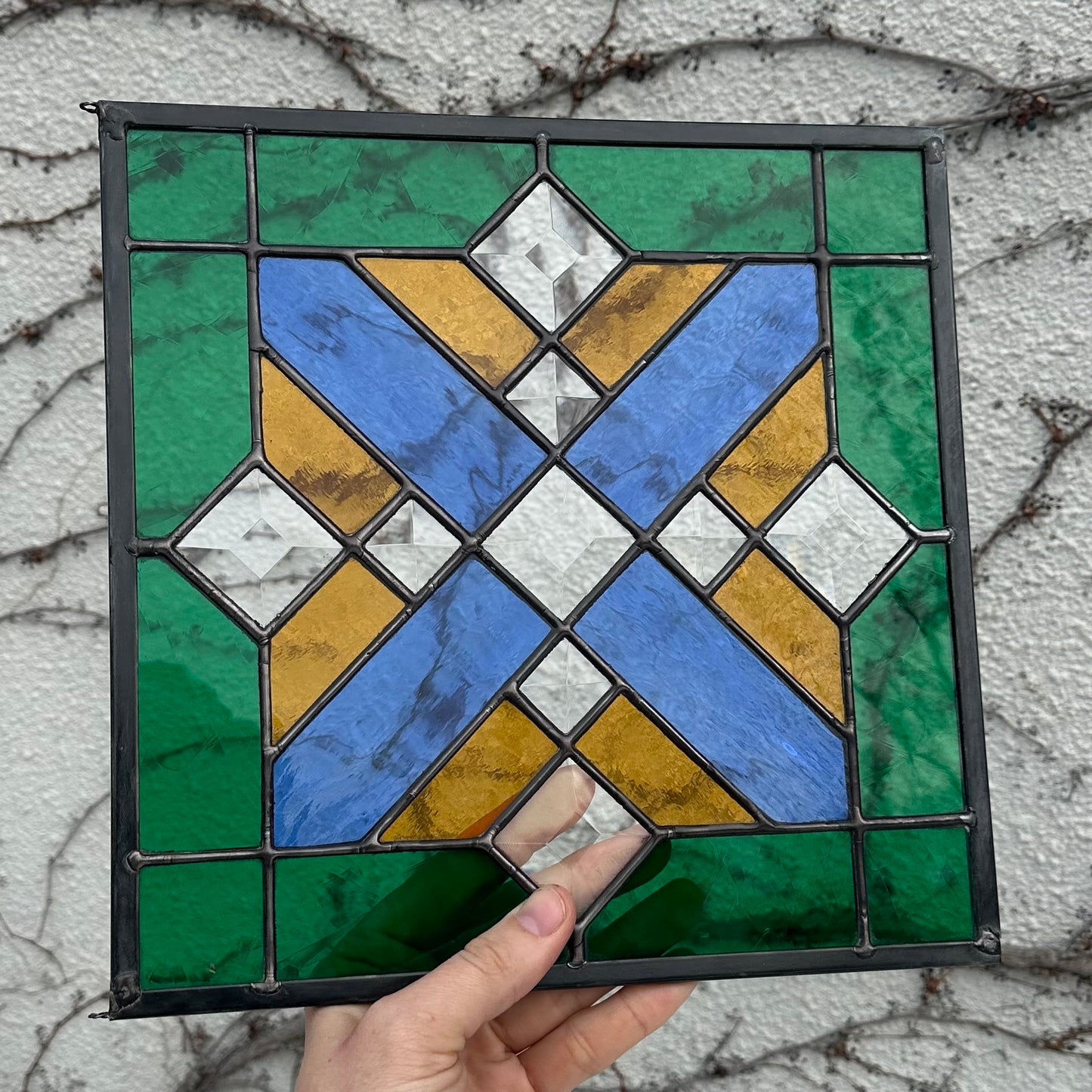 A geometric stained glass panel.