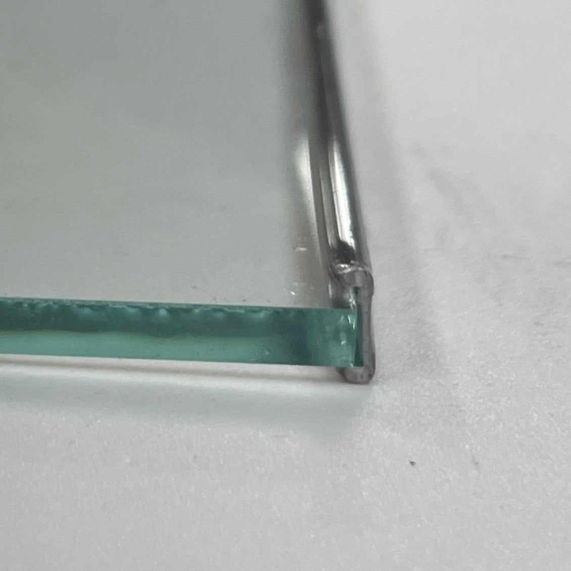 Close-up of a round U-channel lead came with glass.