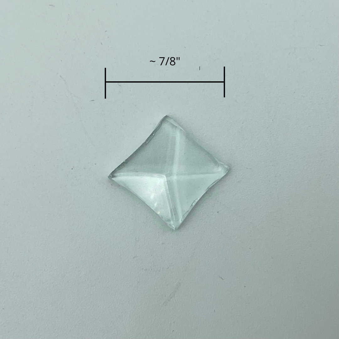 A small glass star bevel with measurements showing 7/8" wide.