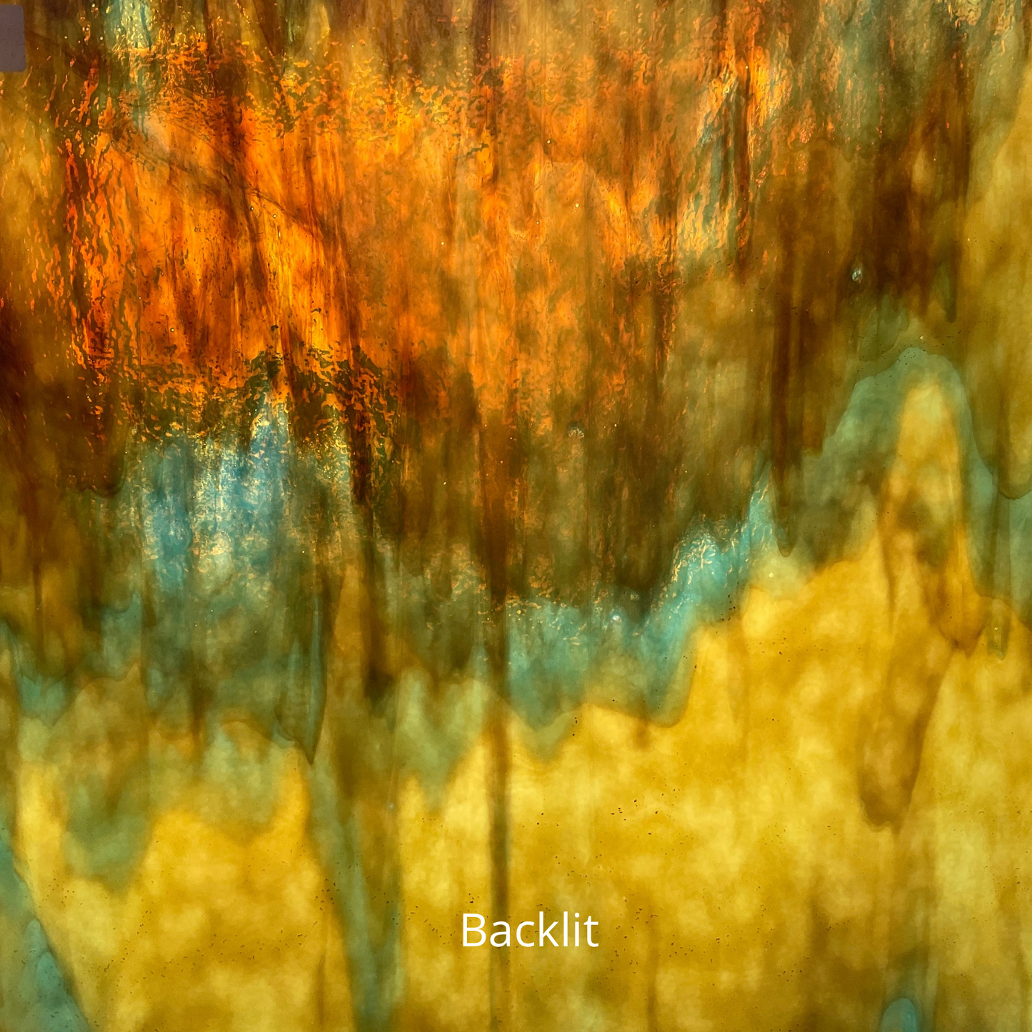 Blue and brown art glass, backlit.