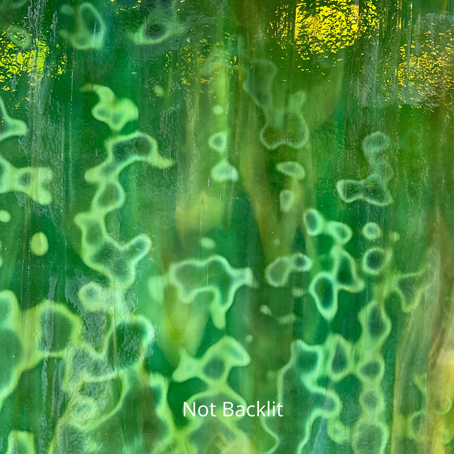 Green and yellow mottled art glass.