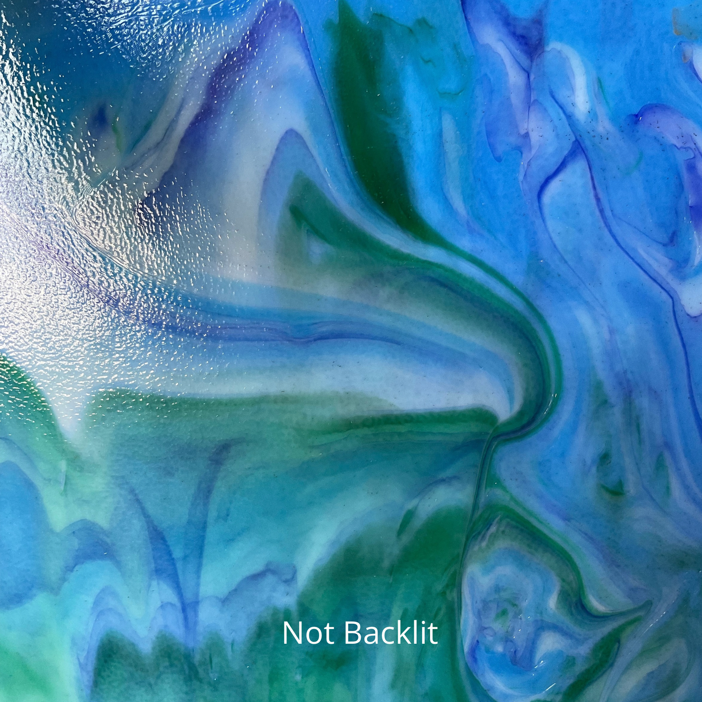 Green blue and white art glass.
