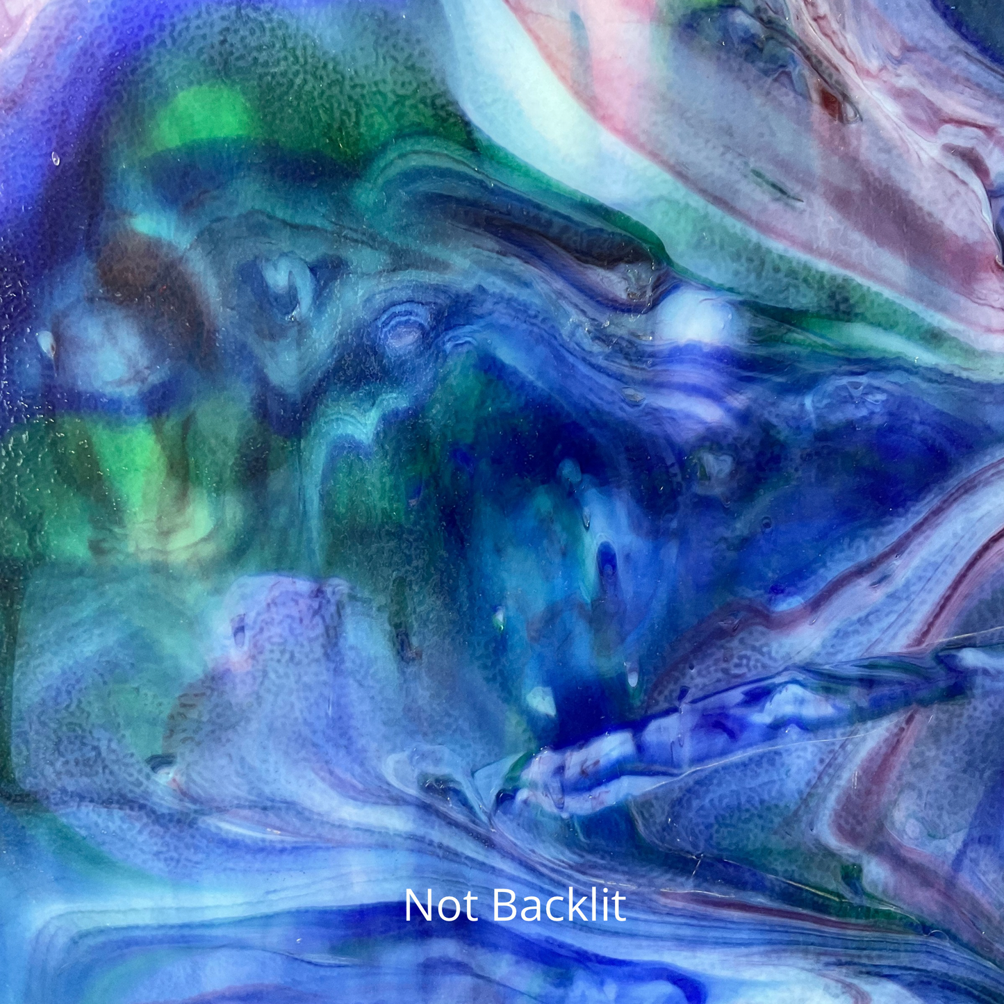 Green blue pink and purple art glass.