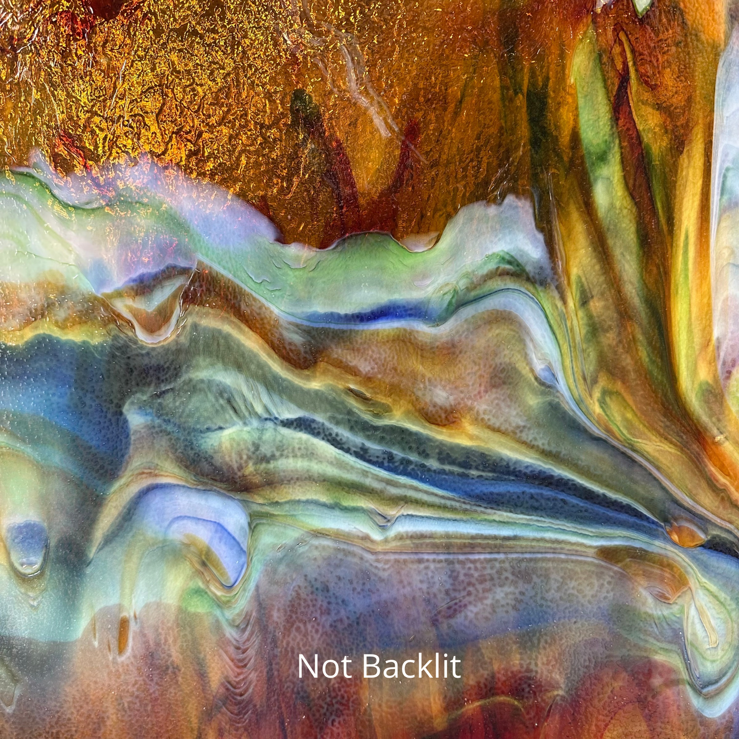Art glass sheet, yellow with green and blue.