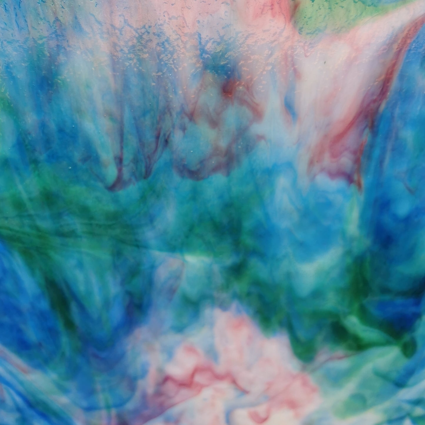 Pink and green and blue art glass.