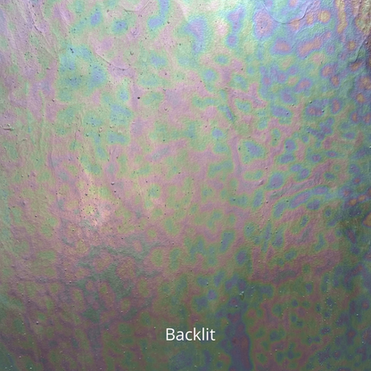 An iridescent sheet of clear milky glass.