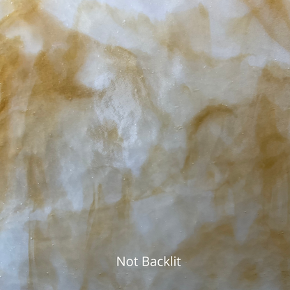 A sheet of amber and white glass for stained glass.