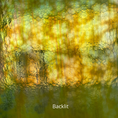 Backlit photo of yellow iridescent glass.