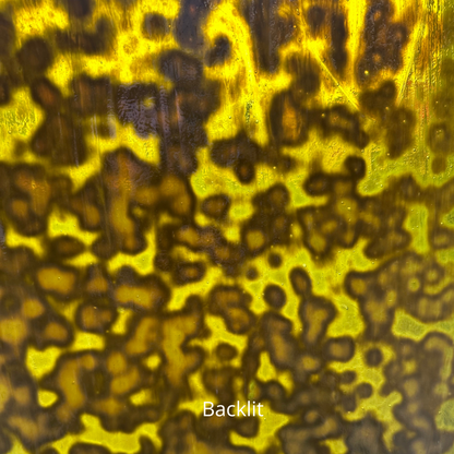 Yellow-green mottled art glass.