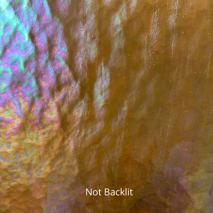 An iridescent amber piece of glass.