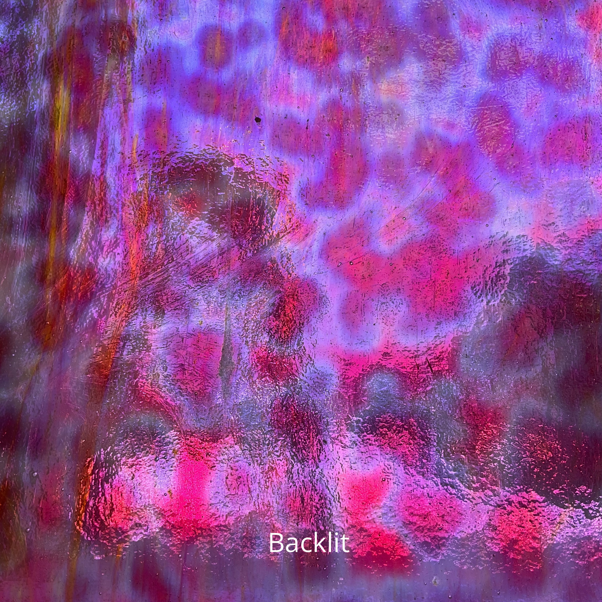 Pink and purple mottled art glass.