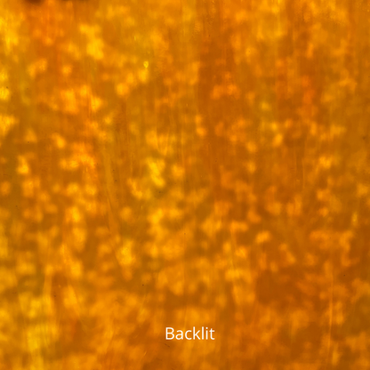 Mottled amber art glass.