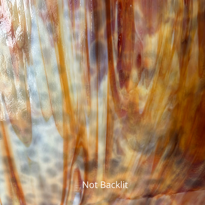 White and orange and red mottled art glass.