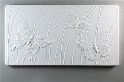 A butterfly texture mold for fused glass.