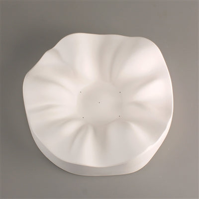 A small organic slump mold for glass fusing.