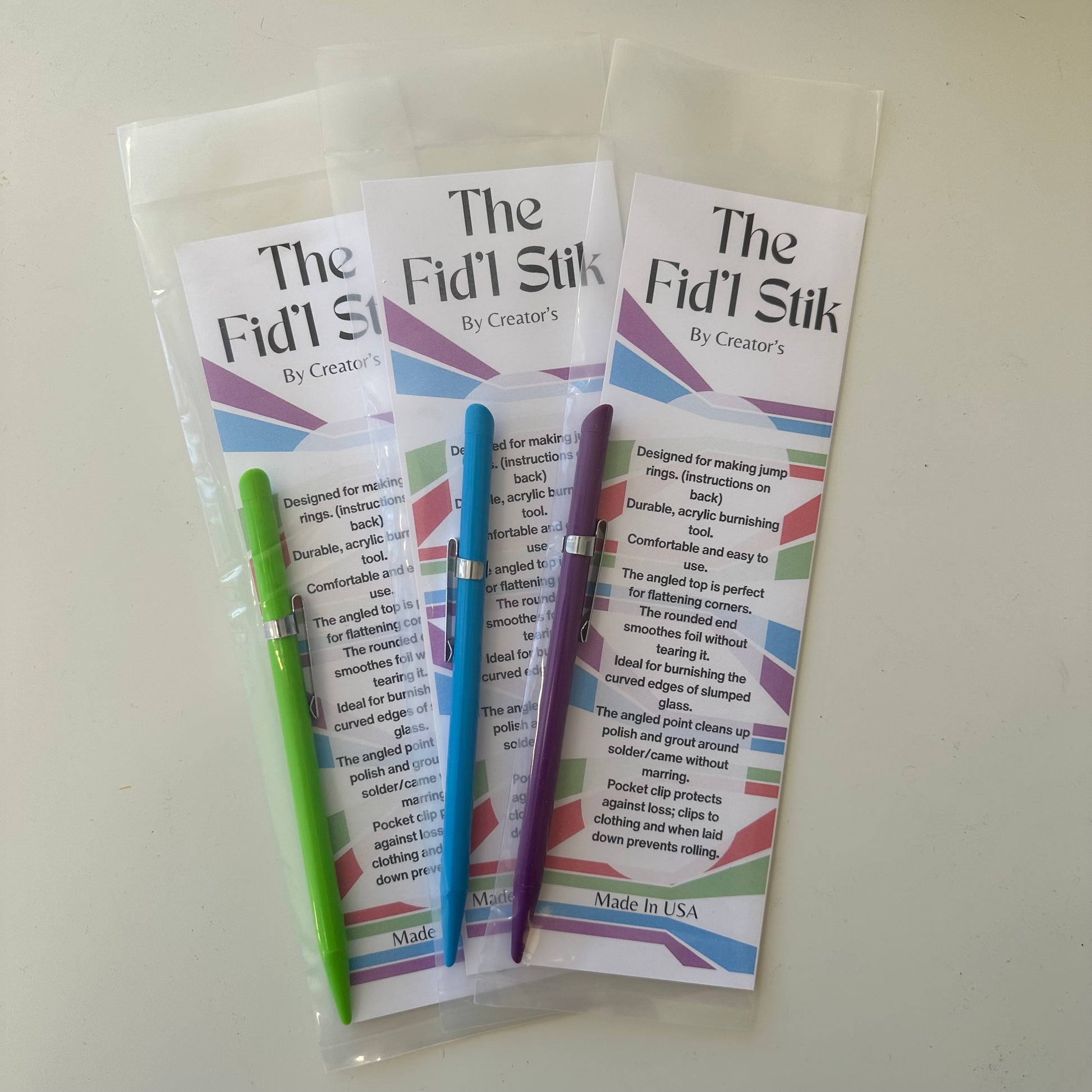 Three fid'l stick tools for stained glass burnishing.