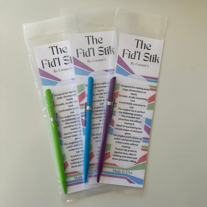 Three fid'l stick tools for stained glass burnishing.