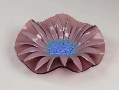 A slumped glass flower dish.