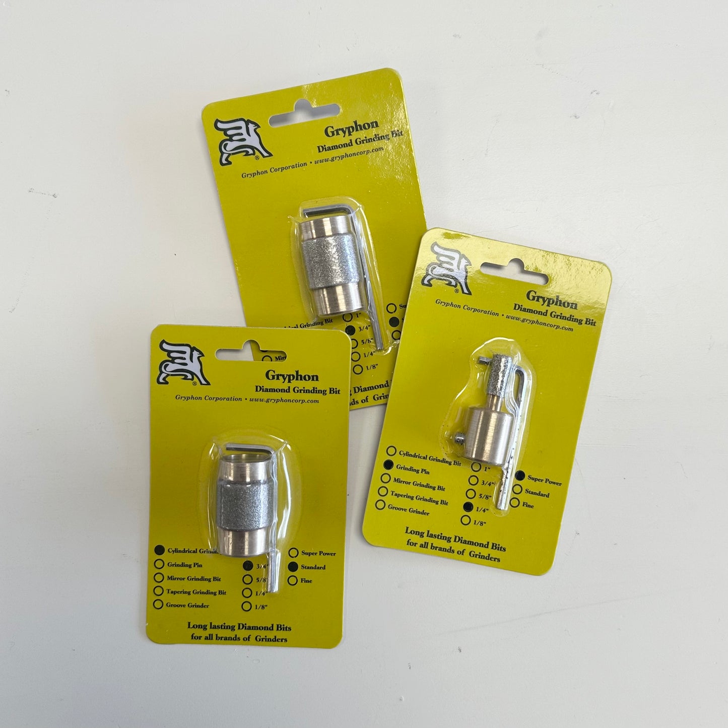 Three packages of gryphon grinder bits for stained glass.