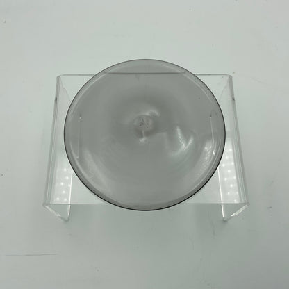 A neutral grey hand blown glass rondel for stained glass work.