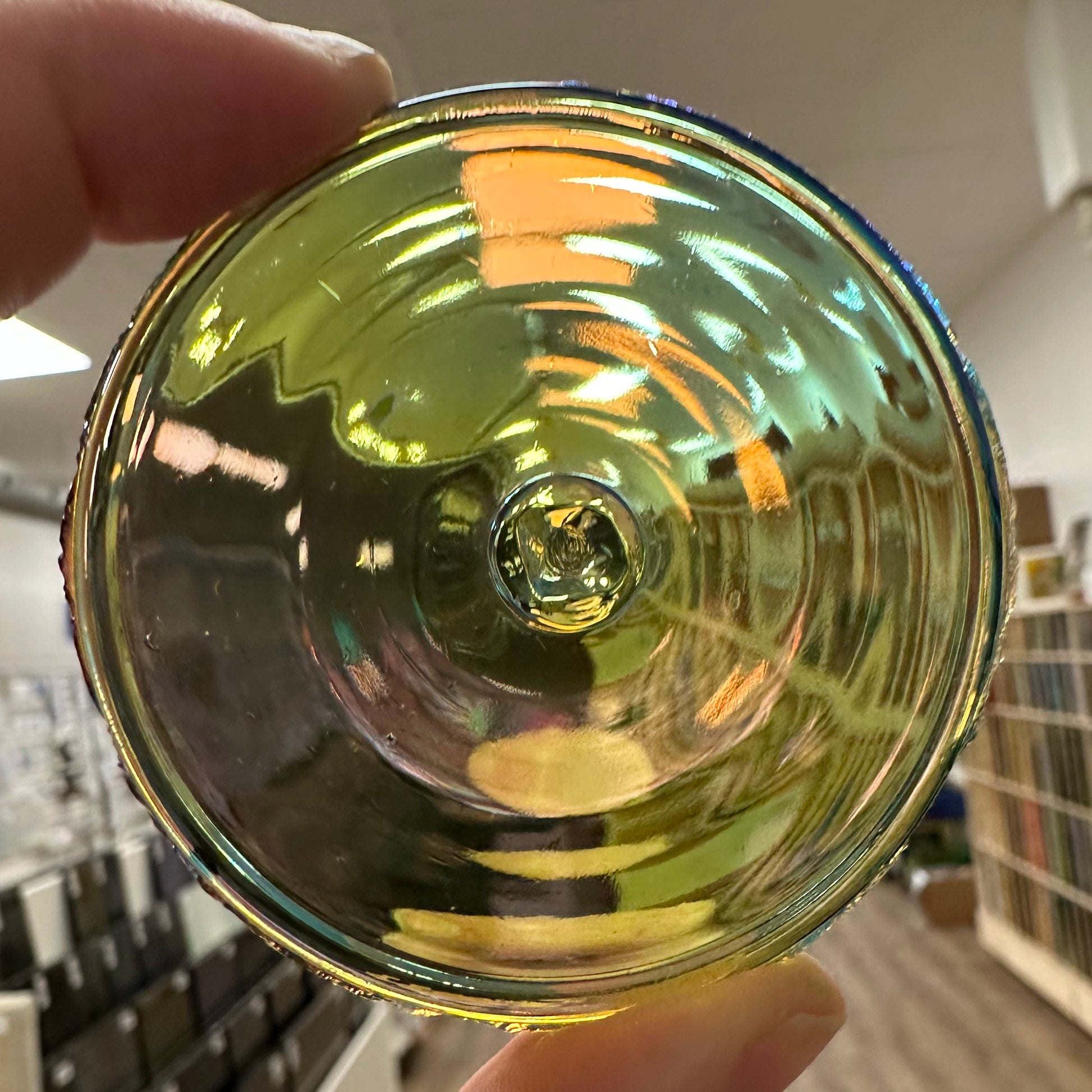 Olive green iridescent glass rondel.