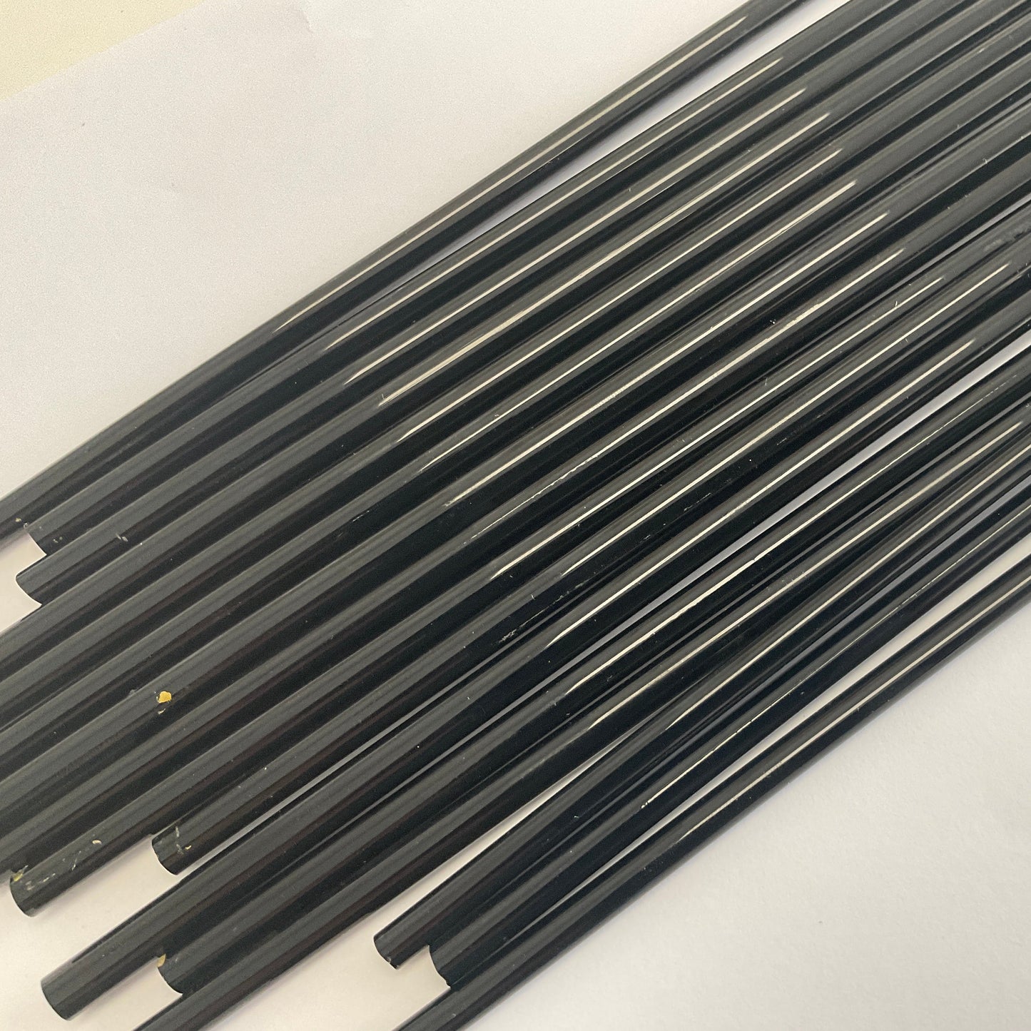 Black glass rods