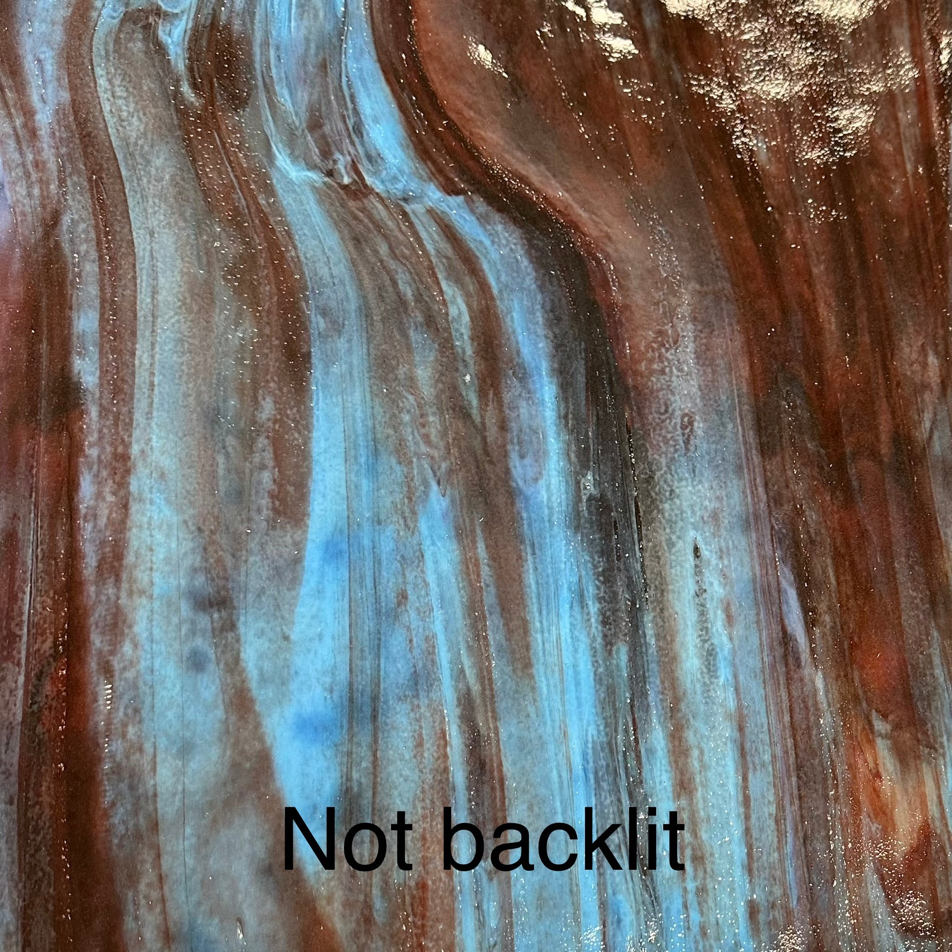 A blue and red piece of sheet glass.