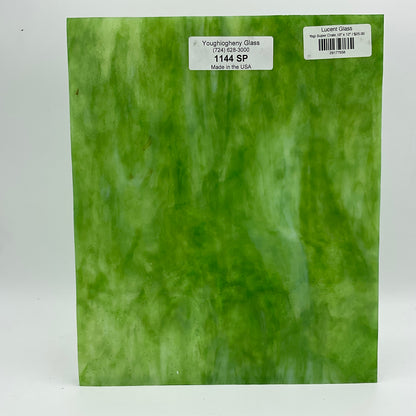 A green and clear stained glass sheet.