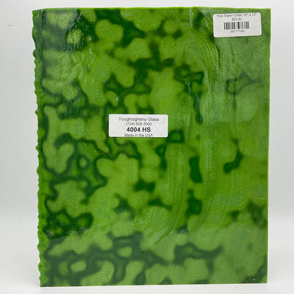 A green mottled stained glass sheet.