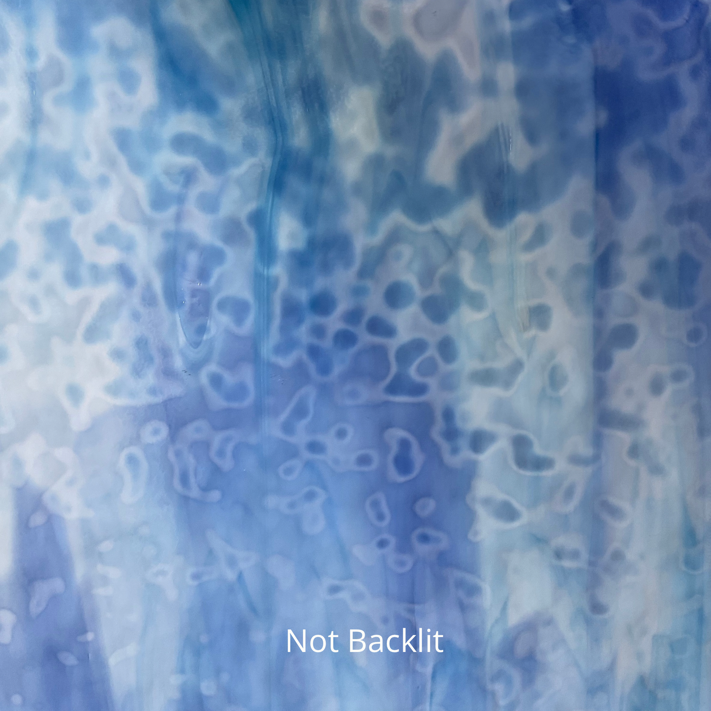 Blue and white mottled art glass.