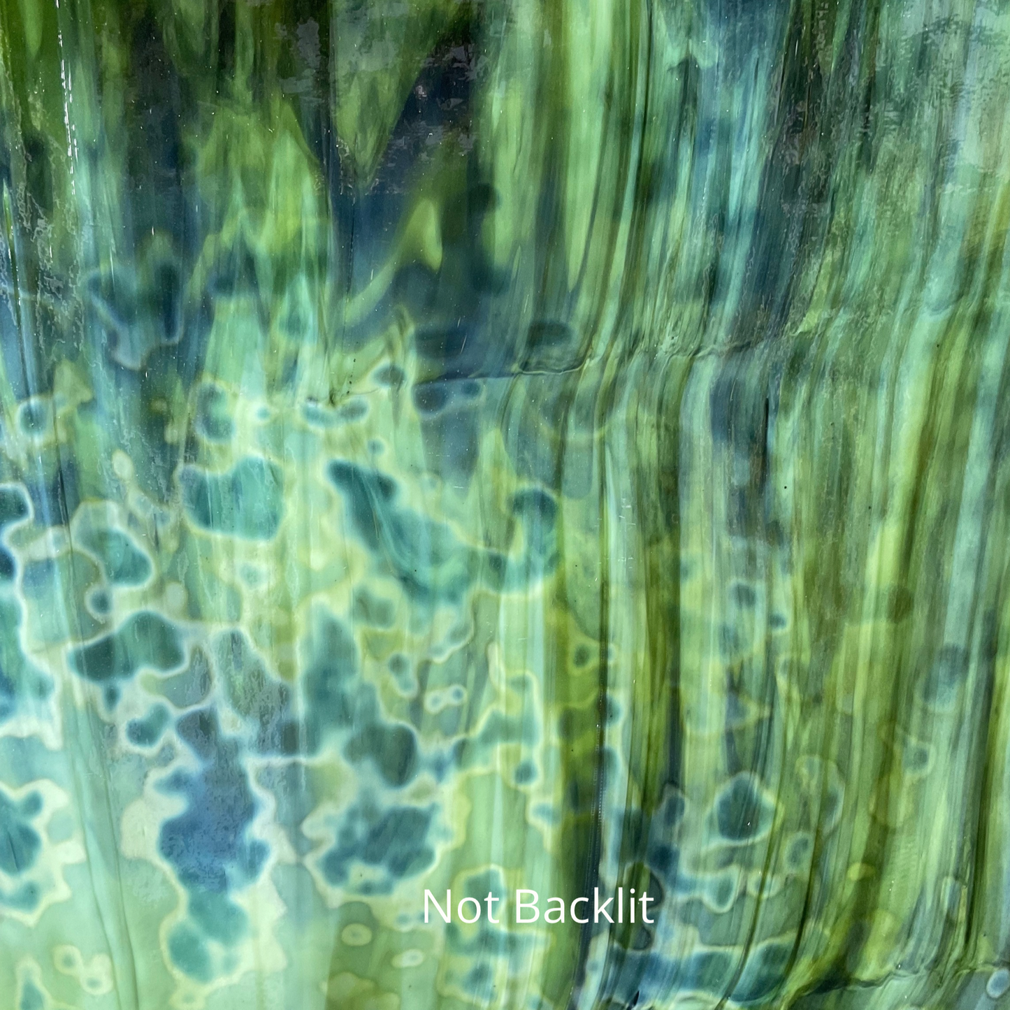 Green mottled art glass.