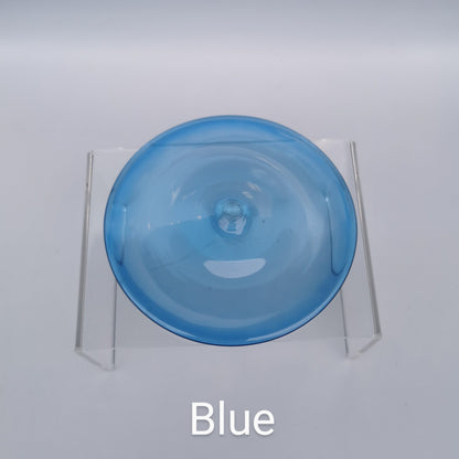 A blue hand blown rondel for stained glass work.