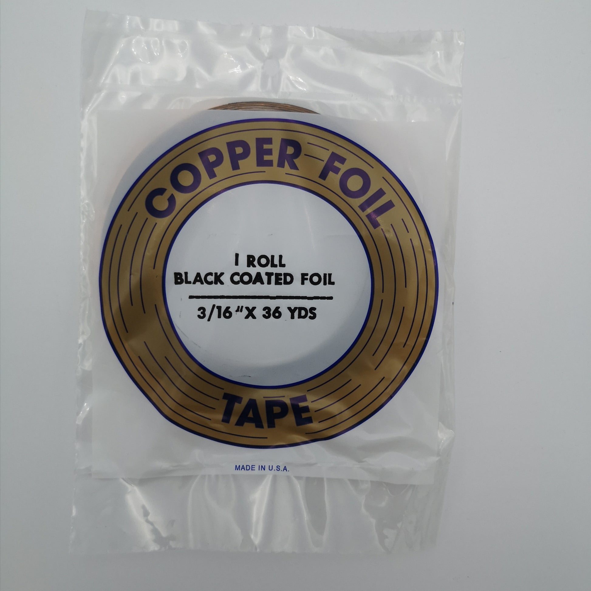 A package of 3/16" black back copper foil for stained glass.