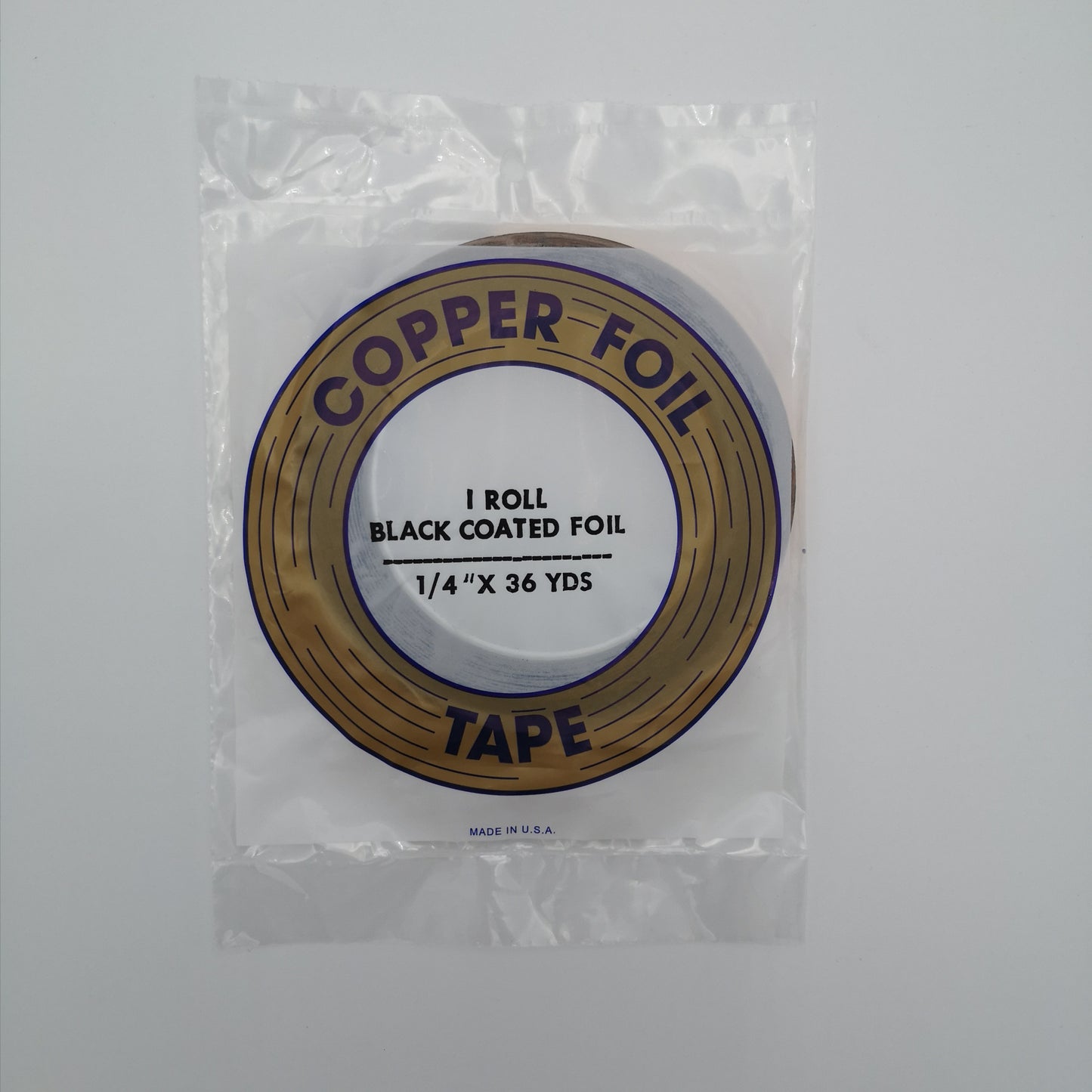 A package of 1/4" black back copper foil for stained glass.