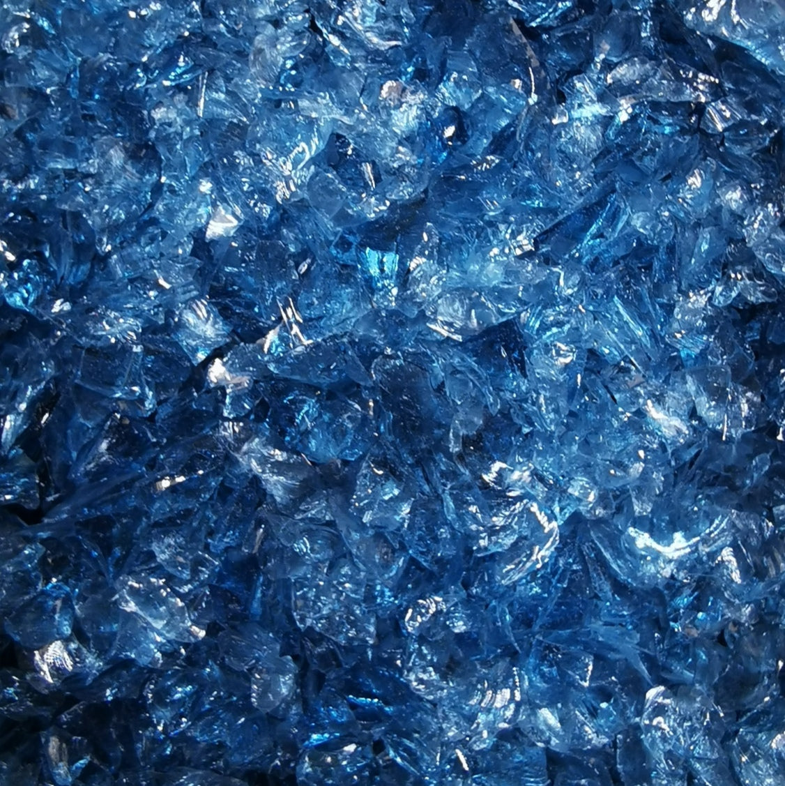 Crushed glass in blue.