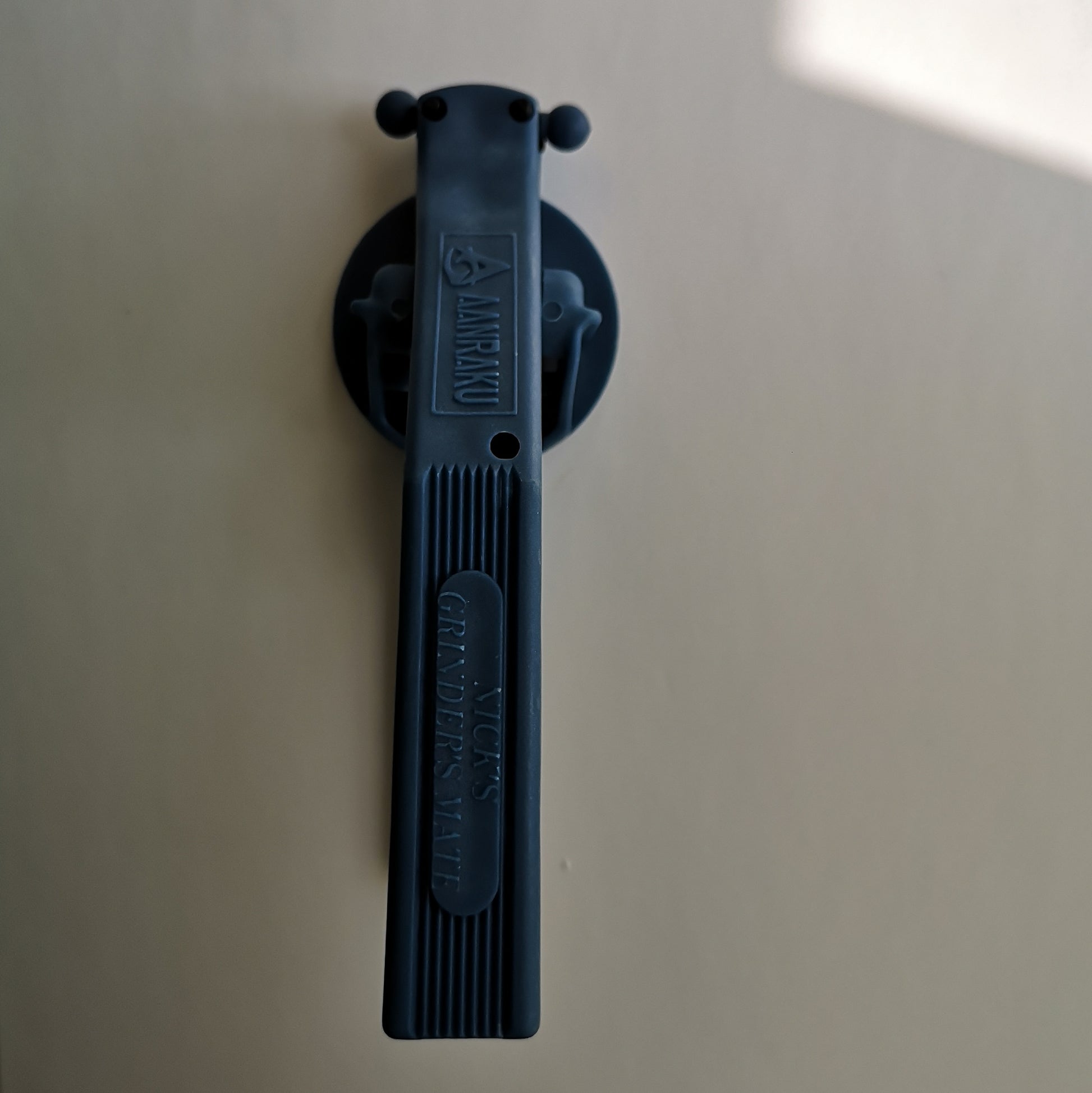 A top view of the Nick's Grinder Mate tool.