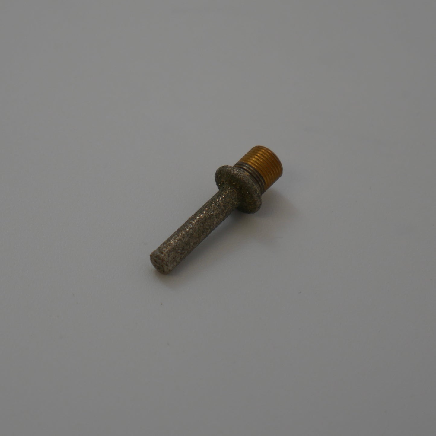 A 1/8" grinder bit for stained glass from Inland.
