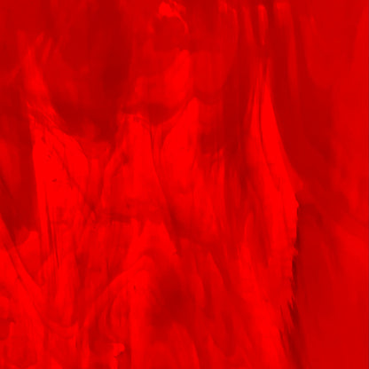 A sheet of red, semi-translucent, smooth fusible art glass.