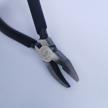 A pair of narrow nose grozing pliers for stained glass.