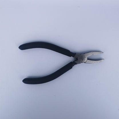 A pair of narrow nose grozing pliers for stained glass.
